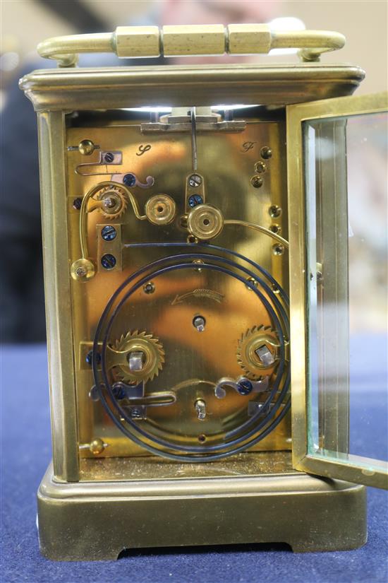 A French eight day repeating carriage clock, retailed by Camerer Kuss